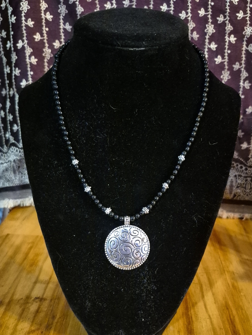 Silver Swirl Pendant Necklace with Black Beads